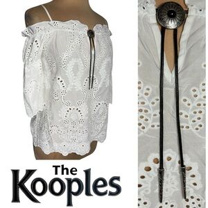 The Kooples white eyelet off the shoulder blouse with western style lariat tie